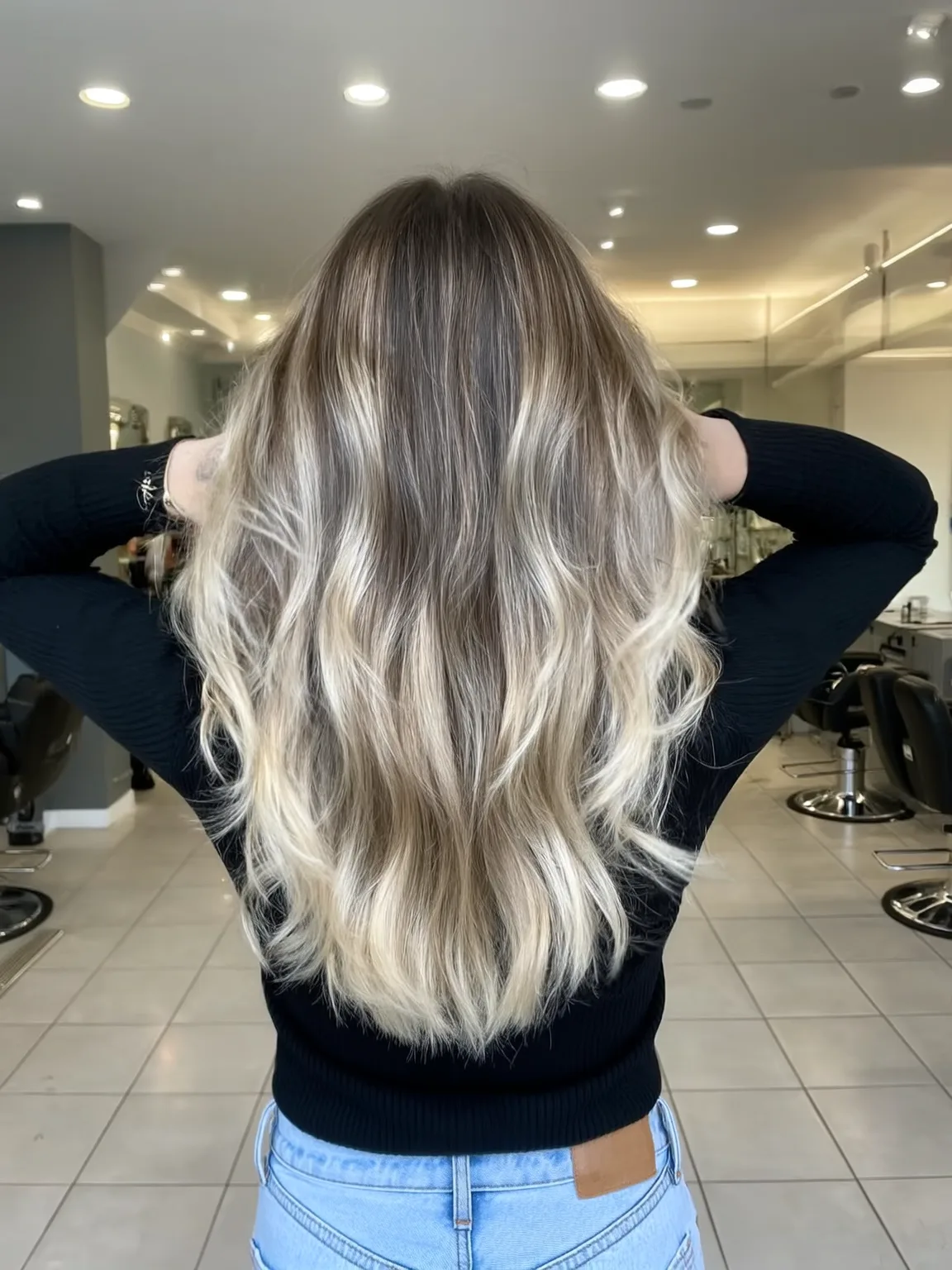 Long Voluminous Wavy Layers with Ash Blonde Balayage